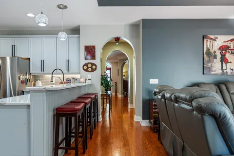 a view of a kitchen from the hallway