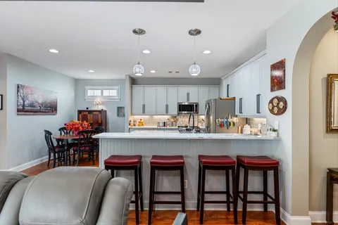 a view of cabinets and window