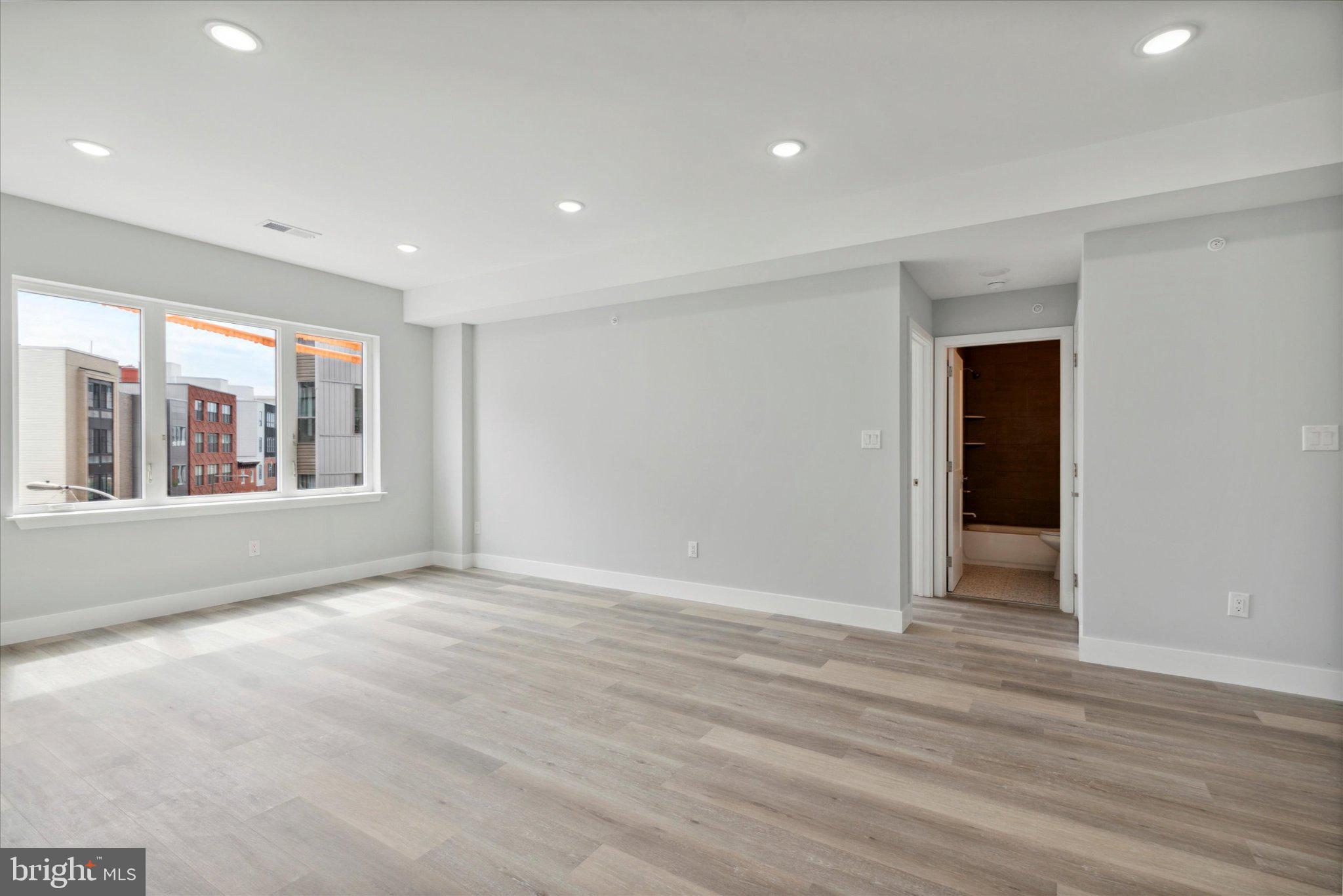 1600 Ridge Avenue Philadelphia, PA 19130 - Photo 4 of 26 Living Room w/ hall bath/bedroom 2 on the right