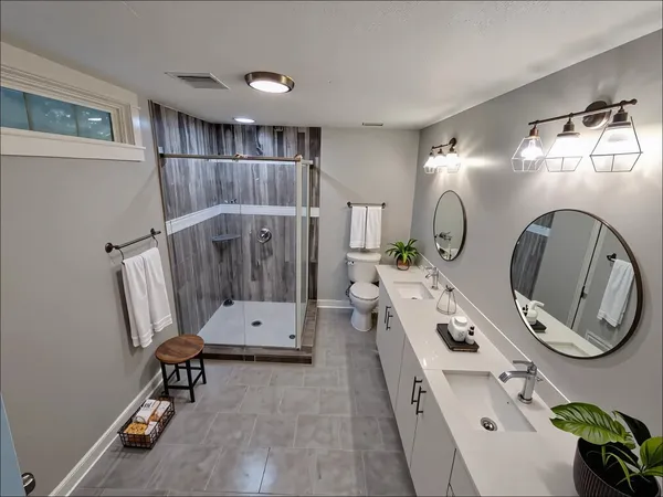 a view of living room with furniture and entryway