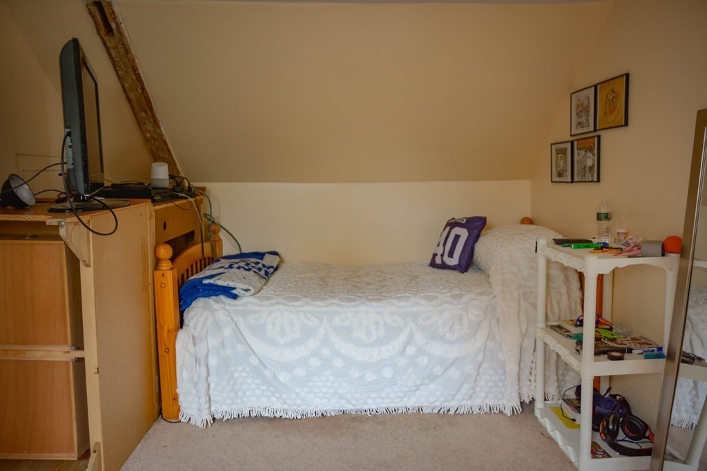 345 Richardson Road Ashby, MA 01431 - Photo 22 of 37 a view of walk in closet with clothes and shoes