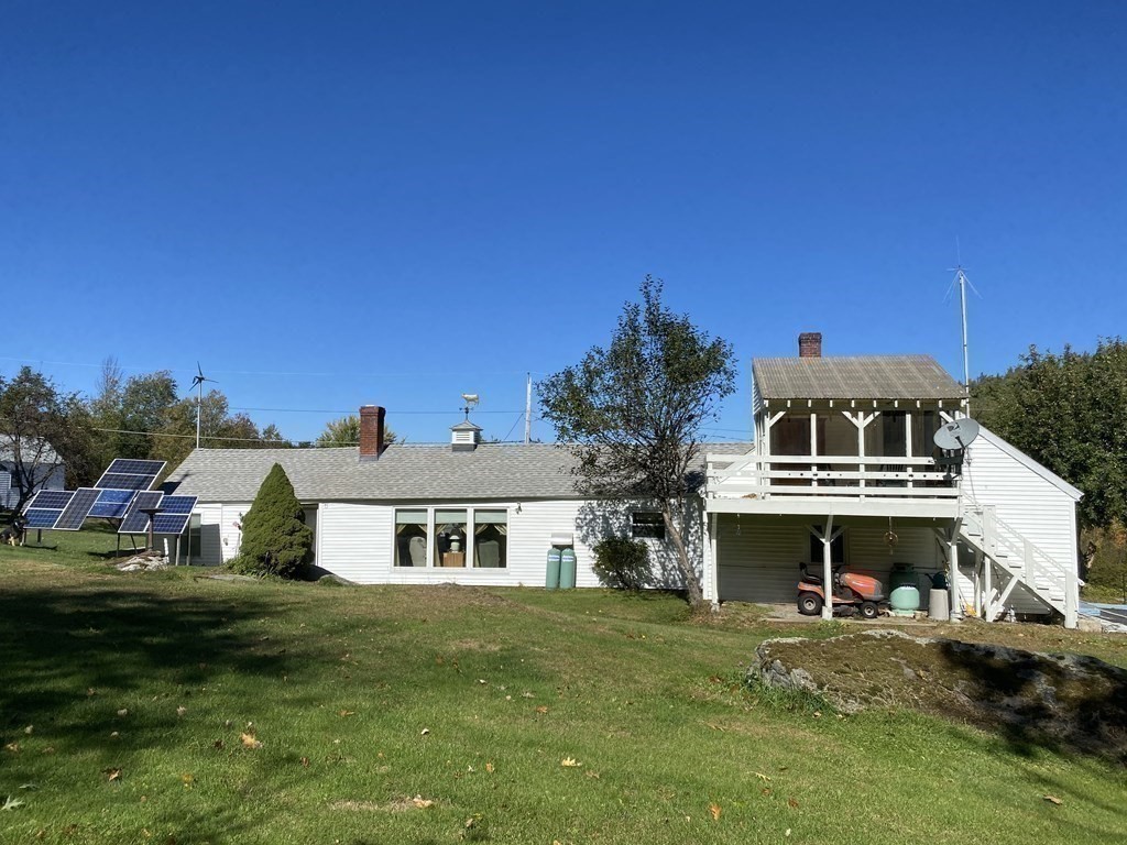 345 Richardson Road Ashby, MA 01431 - Photo 28 of 37 a front view of a house with a garden