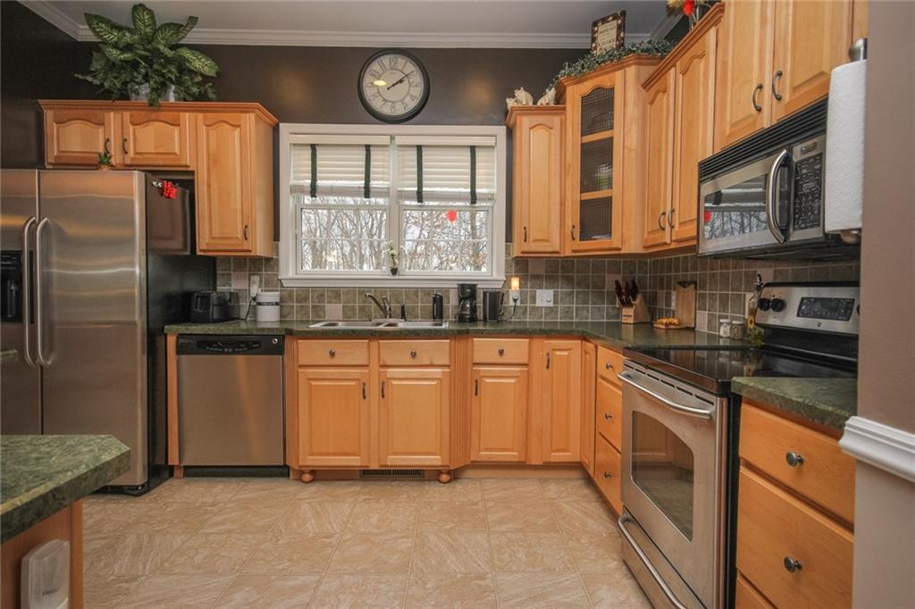 393 Mowry Road Monaca, PA 15061 - Photo 4 of 25 Plenty of cabinets, stainless steel appliances.