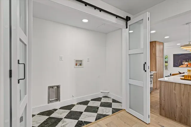 a view of a bathroom with a sink and a shower