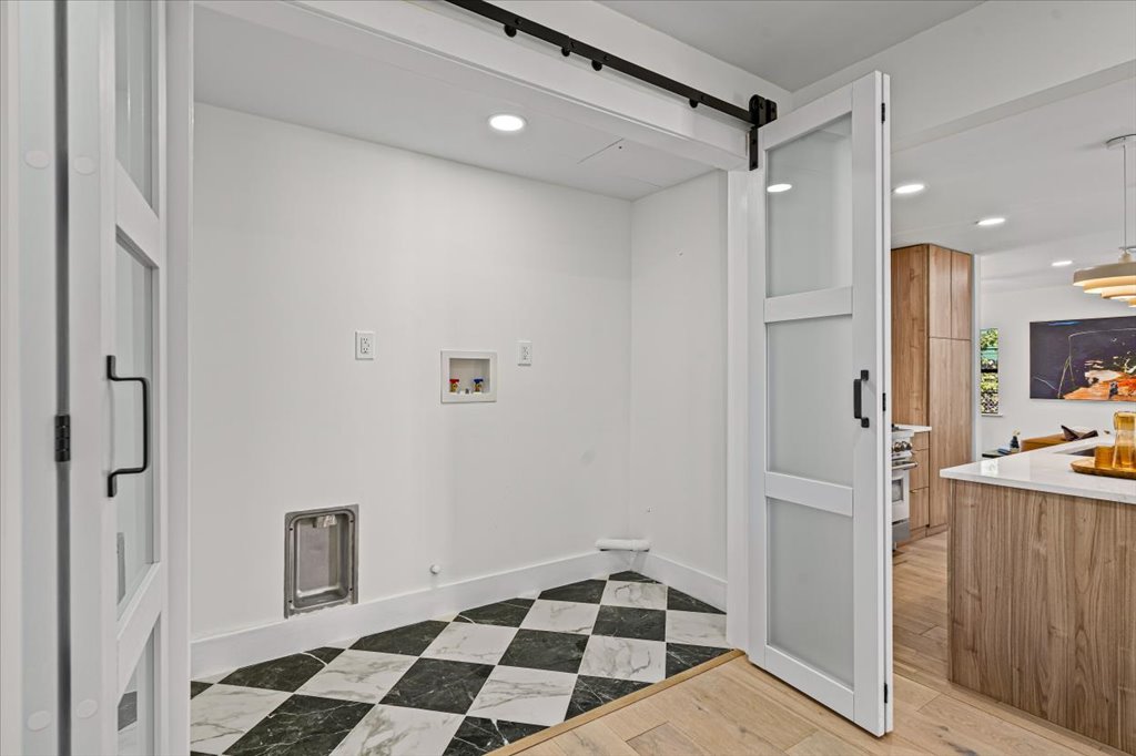 2014 Hardy Circle Austin, TX 78757 - Photo 18 of 34 a view of a bathroom with a sink and a shower