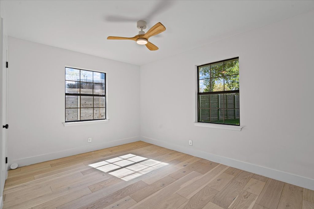2014 Hardy Circle Austin, TX 78757 - Photo 26 of 34 a view of empty room with windows