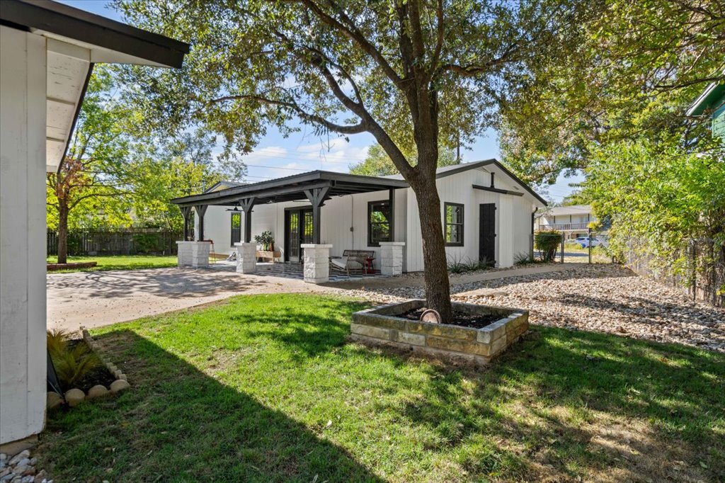 2014 Hardy Circle Austin, TX 78757 - Photo 30 of 34 a front view of a house with garden