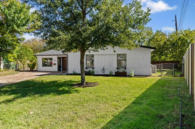 a house view with a garden space