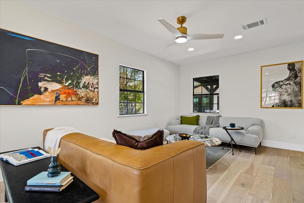 2014 Hardy Circle Austin, TX 78757 - Photo 7 of 34 a living room with furniture and wall paintings