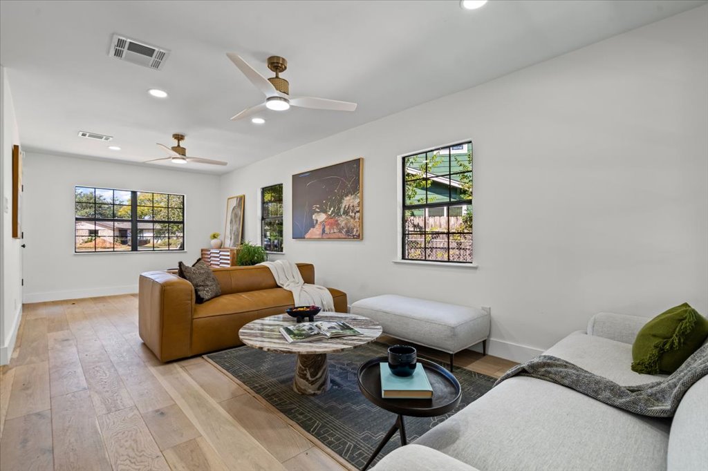 2014 Hardy Circle Austin, TX 78757 - Photo 8 of 34 a living room with furniture and a window