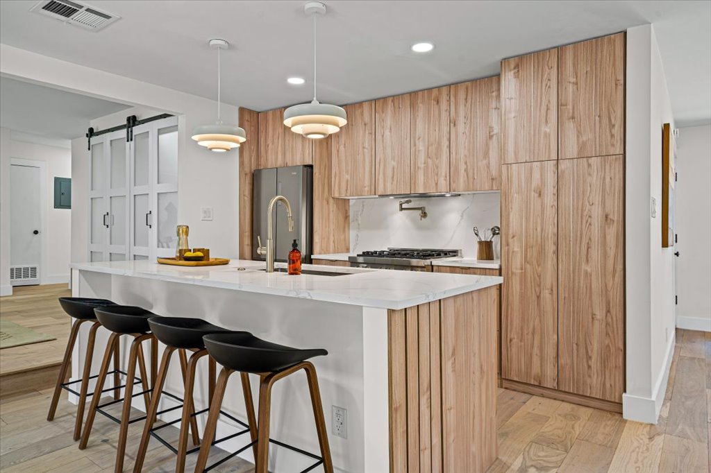 2014 Hardy Circle Austin, TX 78757 - Photo 10 of 34 a kitchen with a sink cabinets and window