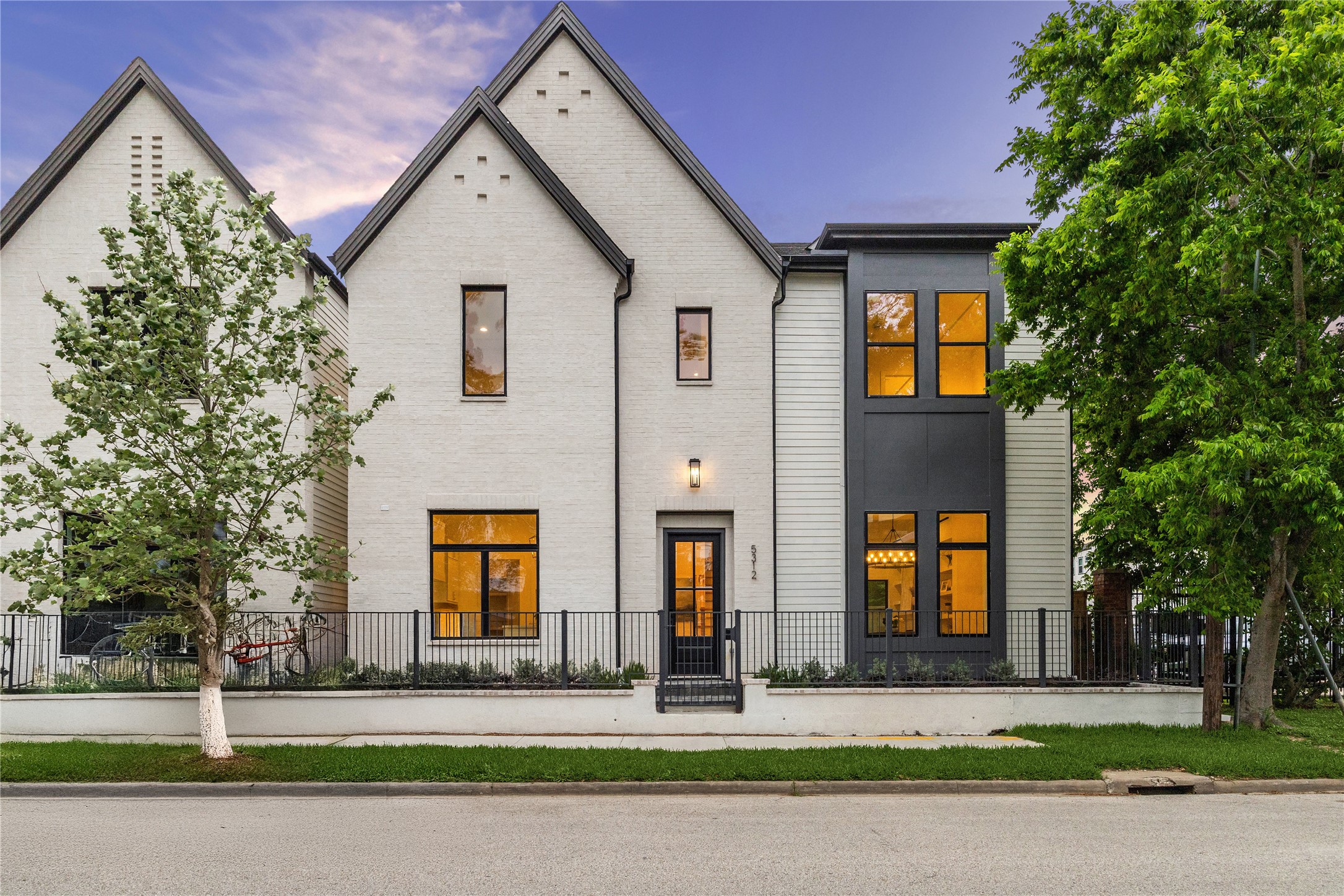 Exceptional Curb Appeal - This home comes with a well-proportioned handsome elevation. Elegant combination of hand slurred brick, painted carriage style garage door with a terracotta paver driveway.