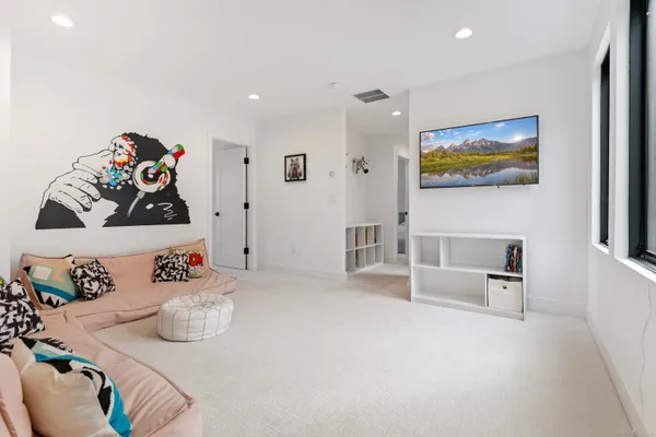 a bathroom with a sink vanity tub and a mirror