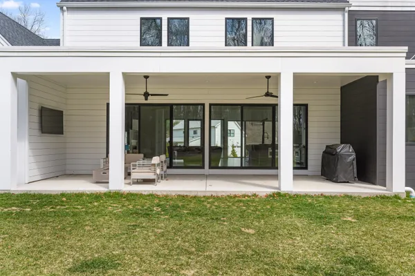 a view of a patio with a backyard