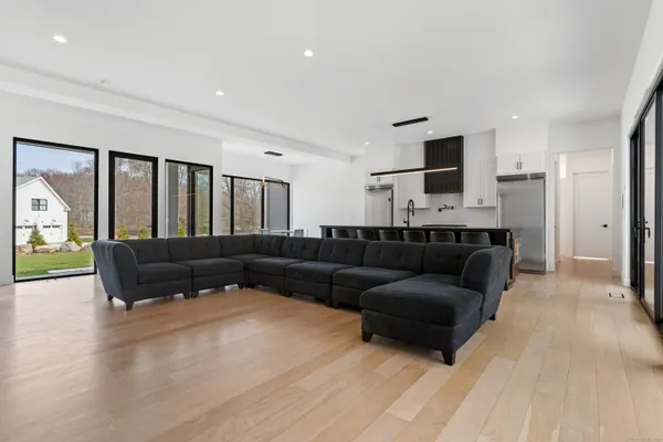 a living room with a couch and a flat screen tv