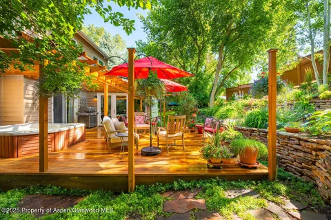 a backyard of a house with lots of green space