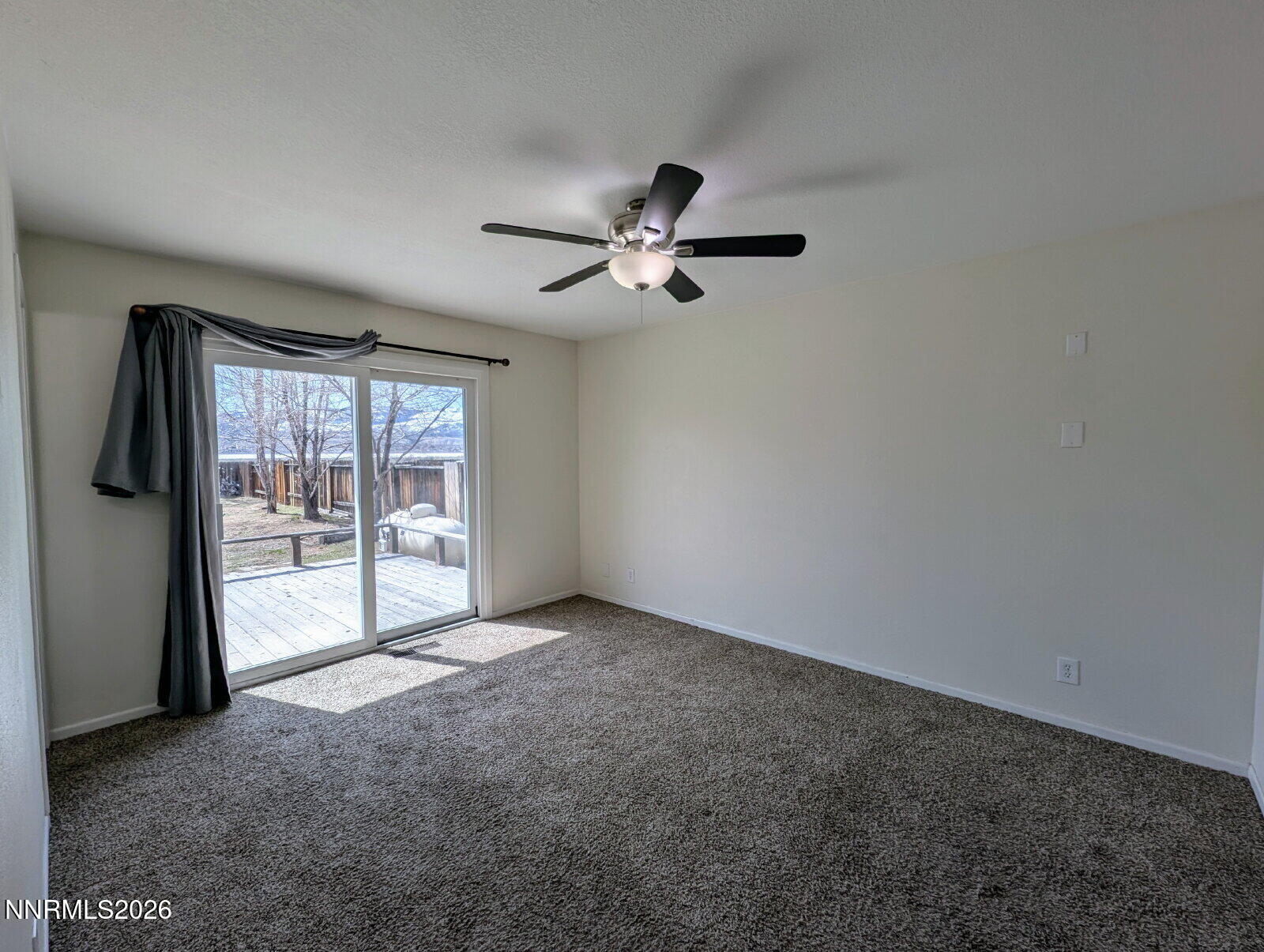 3440 Canvasback Lane Reno, NV 89508 - Photo 15 of 45 a view of an empty room with a window