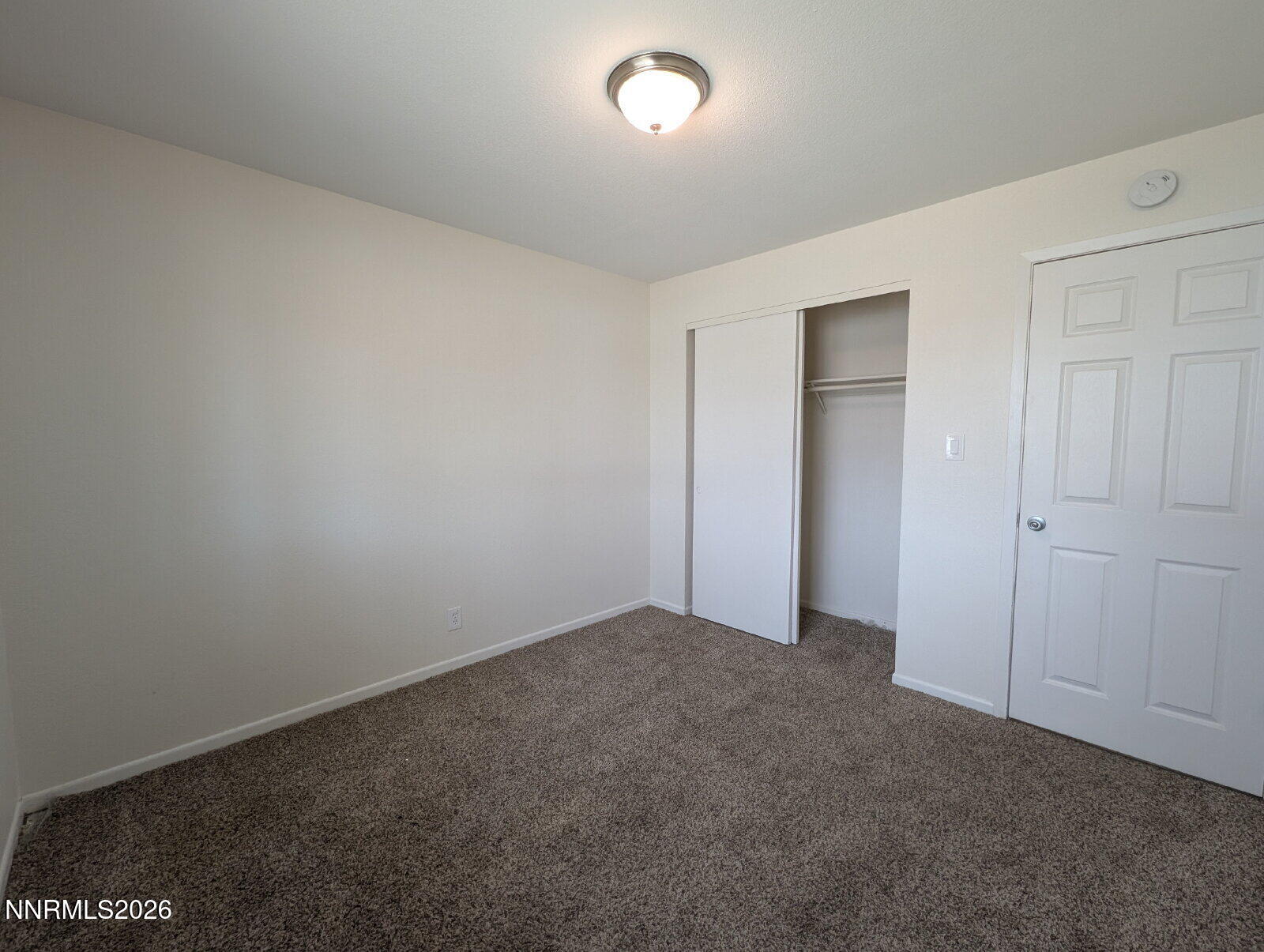 3440 Canvasback Lane Reno, NV 89508 - Photo 18 of 45 an empty room with an entryway