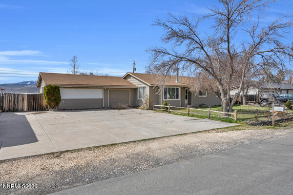 3440 Canvasback Lane Reno, NV 89508 - Photo 2 of 45 a house with trees in front of it
