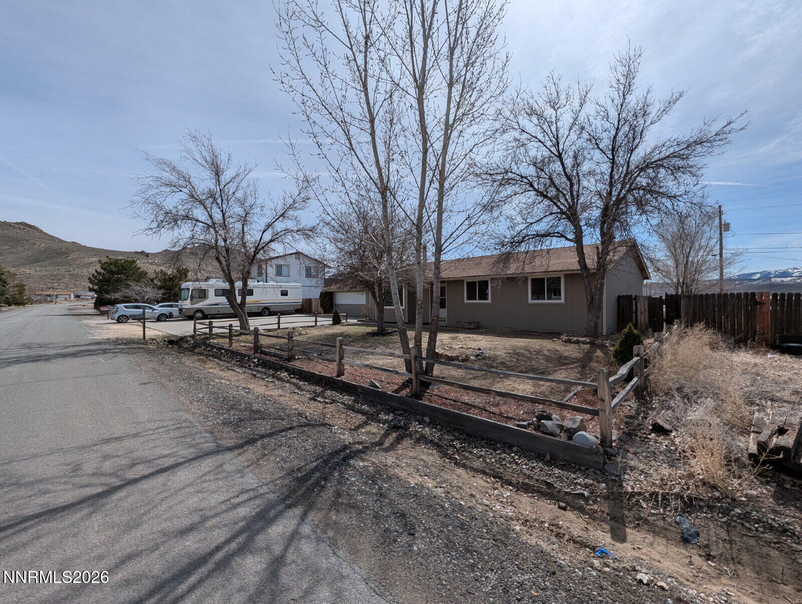 3440 Canvasback Lane Reno, NV 89508 - Photo 4 of 45 a view of a yard with wooden fence