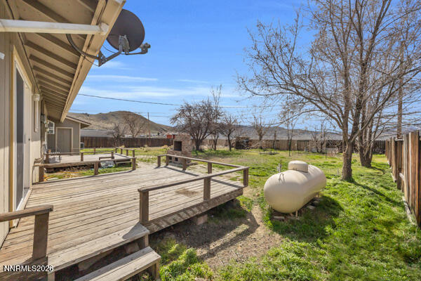 3440 Canvasback Lane Reno, NV 89508 - Photo 41 of 45 a view of a swimming pool with a patio and fire pit