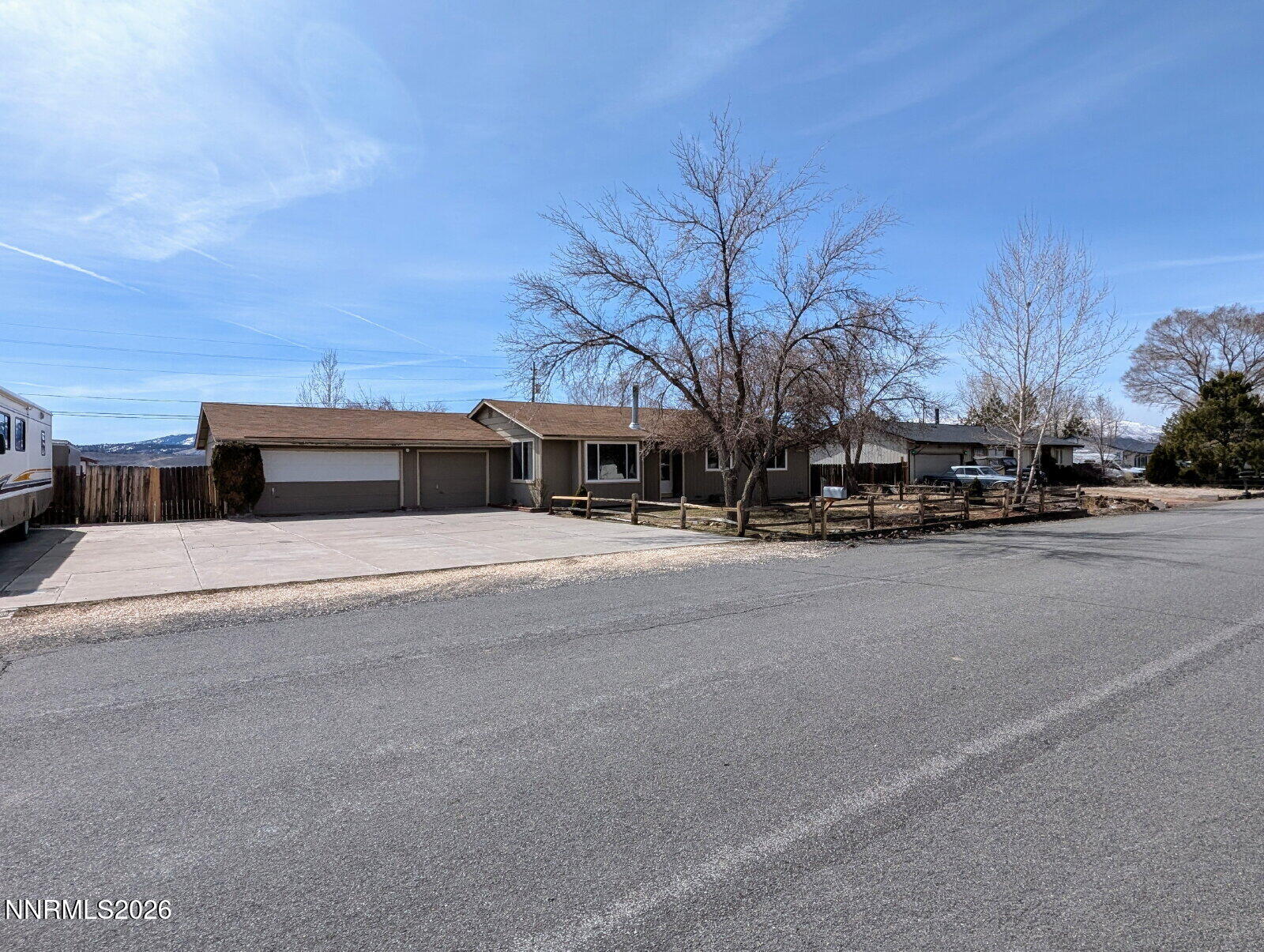 3440 Canvasback Lane Reno, NV 89508 - Photo 5 of 45 a front view of a house with a road