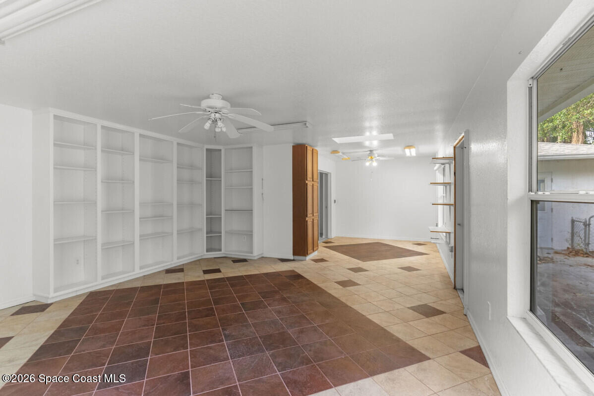 2493 Adamson Road Cocoa, FL 32926 - Photo 23 of 46 a view of a bathroom with a shower