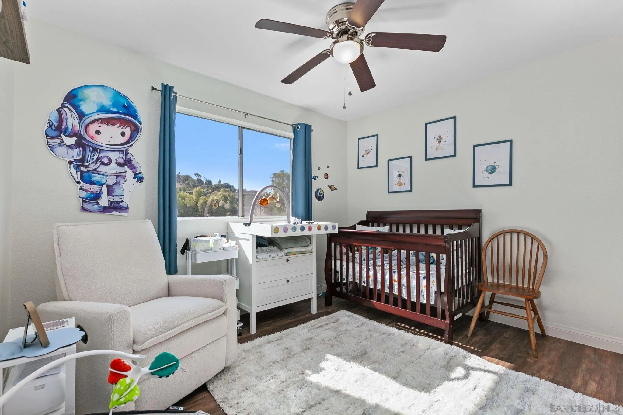 3557 Kenora Drive, Unit 6 Spring Valley, CA 91977 - Photo 15 of 33 a bedroom with furniture and a window