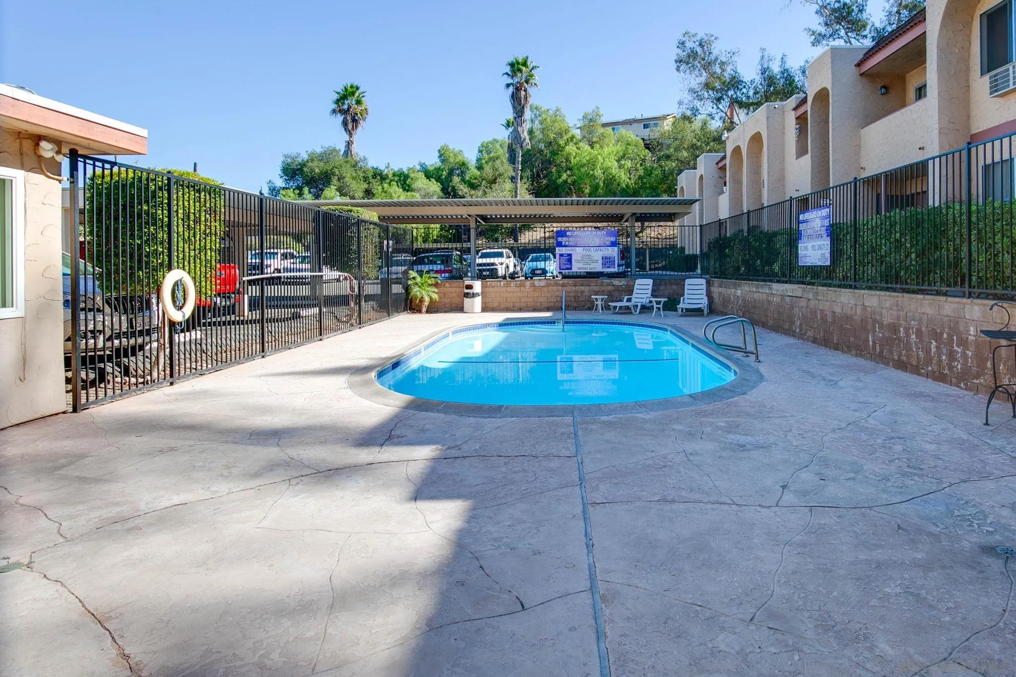 3557 Kenora Drive, Unit 6 Spring Valley, CA 91977 - Photo 16 of 33 a view of a swimming pool with sitting area
