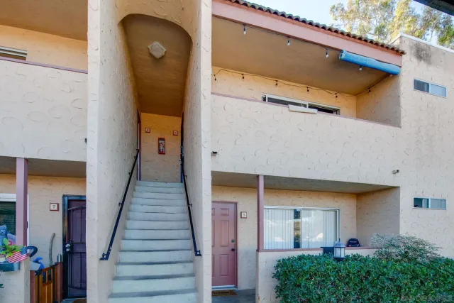 a front view of a house with wooden floor