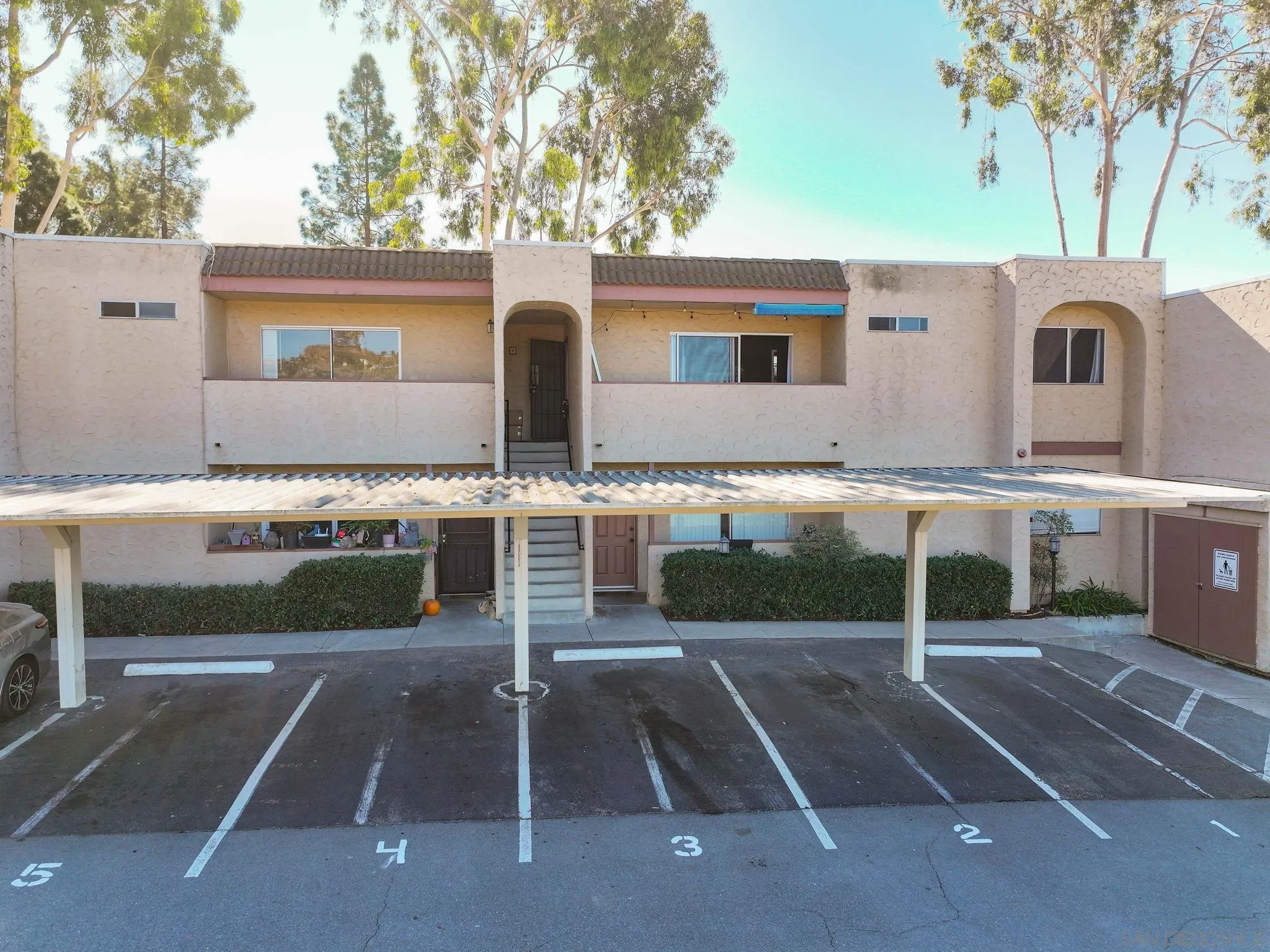 3557 Kenora Drive, Unit 6 Spring Valley, CA 91977 - Photo 18 of 33 a view of a house with a yard