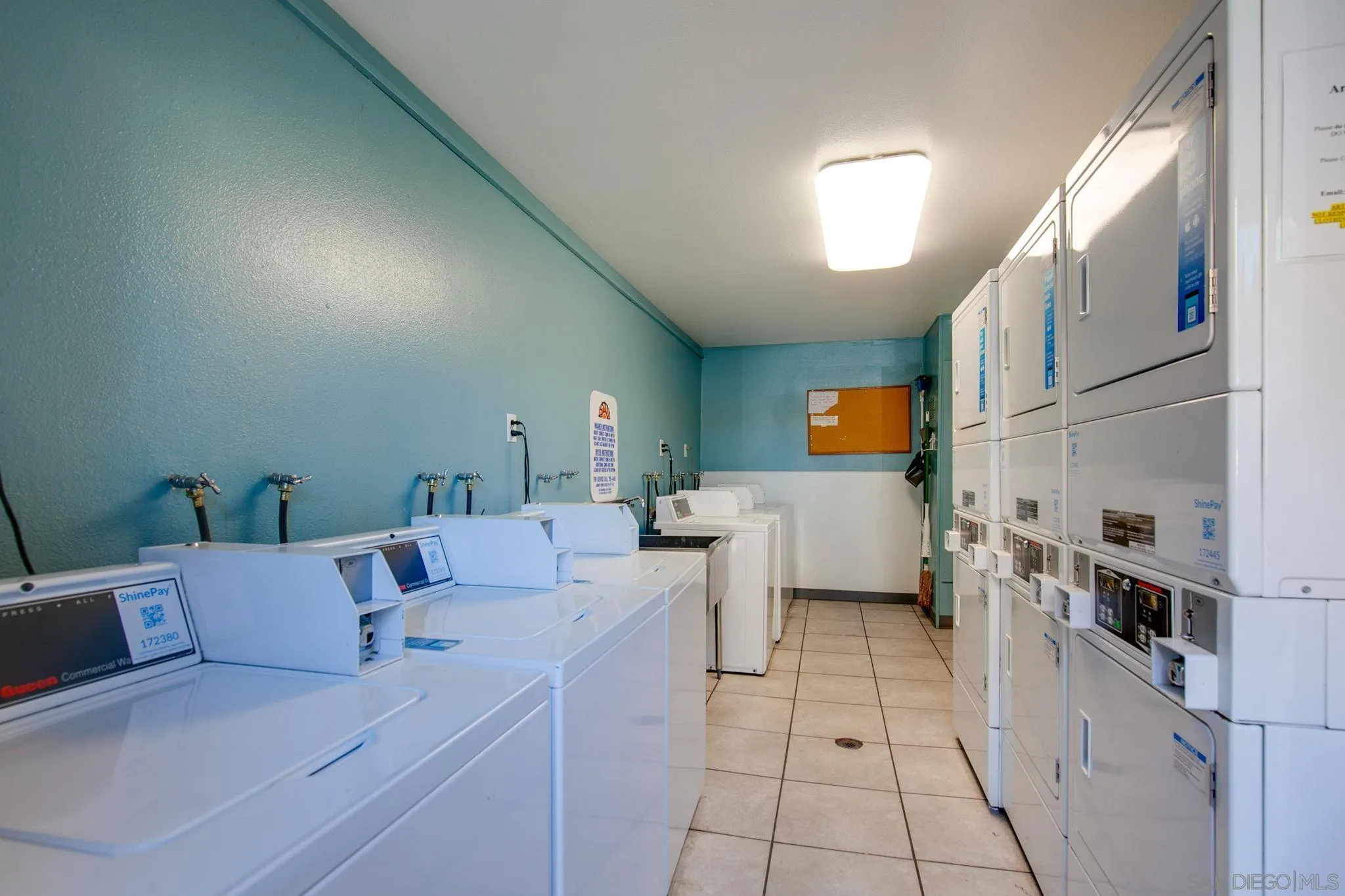 3557 Kenora Drive, Unit 6 Spring Valley, CA 91977 - Photo 20 of 33 a living room with furniture and a flat screen tv