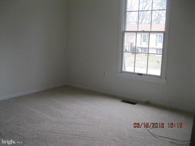 9239 Fowler Lane Lanham, MD 20706 - Photo 11 of 17 an empty room with a window