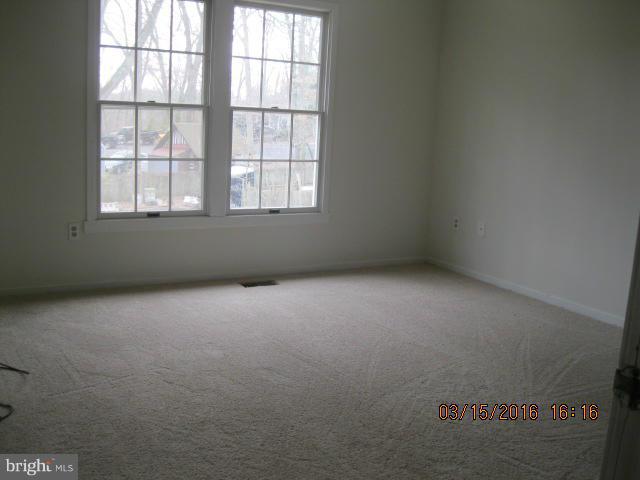 9239 Fowler Lane Lanham, MD 20706 - Photo 12 of 17 an empty room with a window