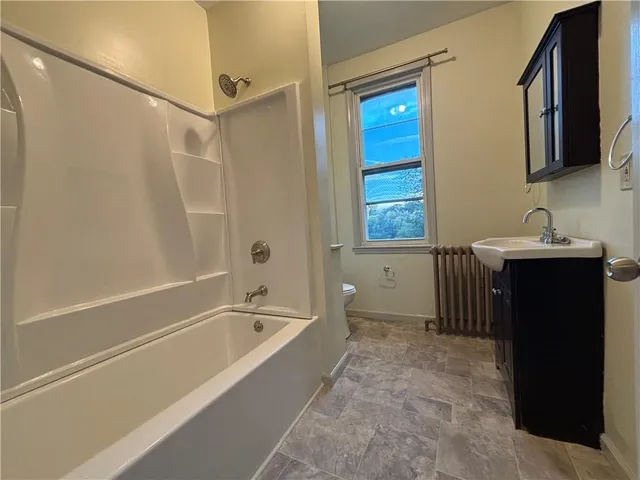 a bathroom with a sink and a bathtub