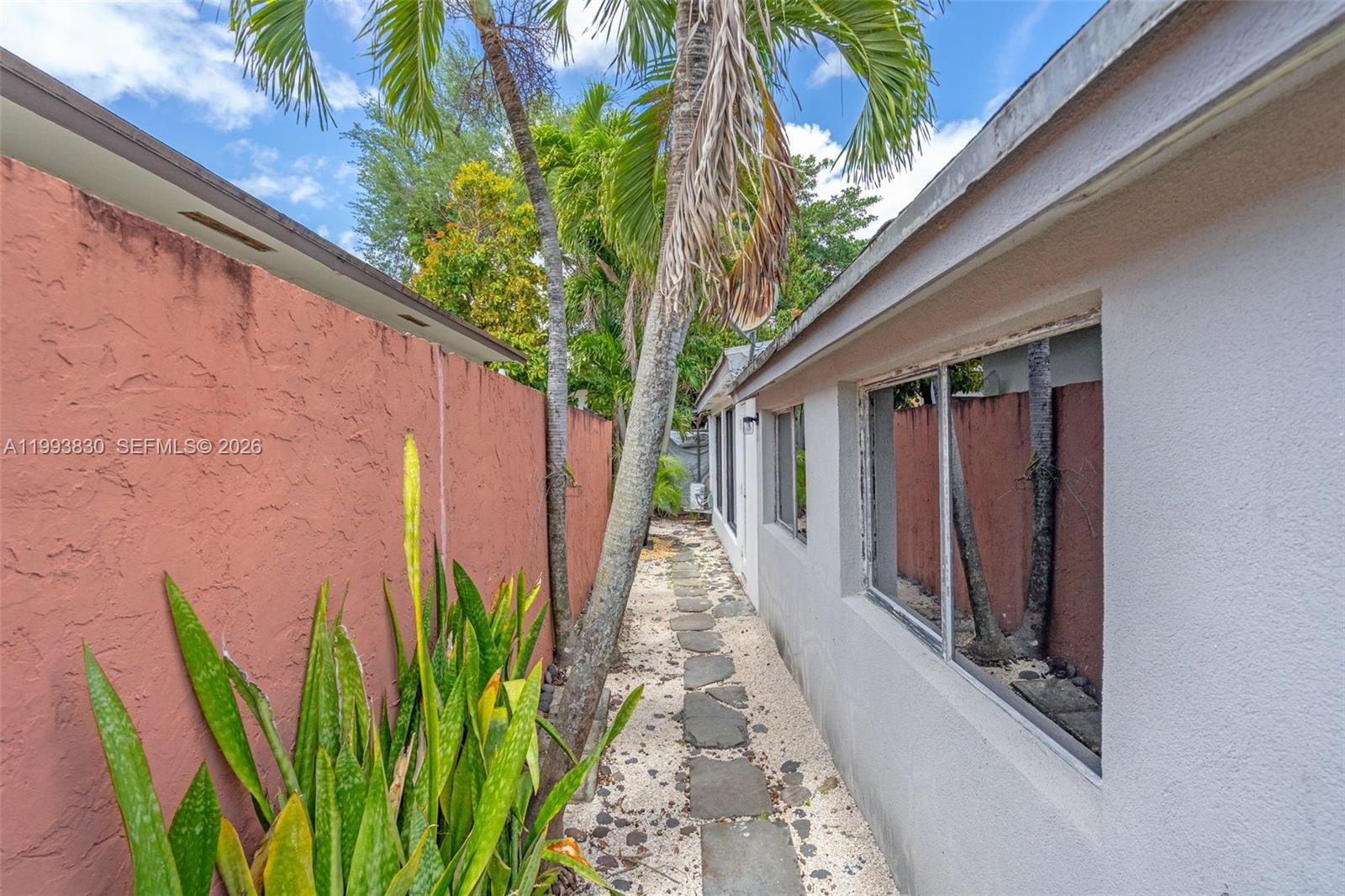 6295 Southwest 29th Street, Unit 1 Miami, FL 33155 - Photo 4 of 15 a view of a backyard with plants