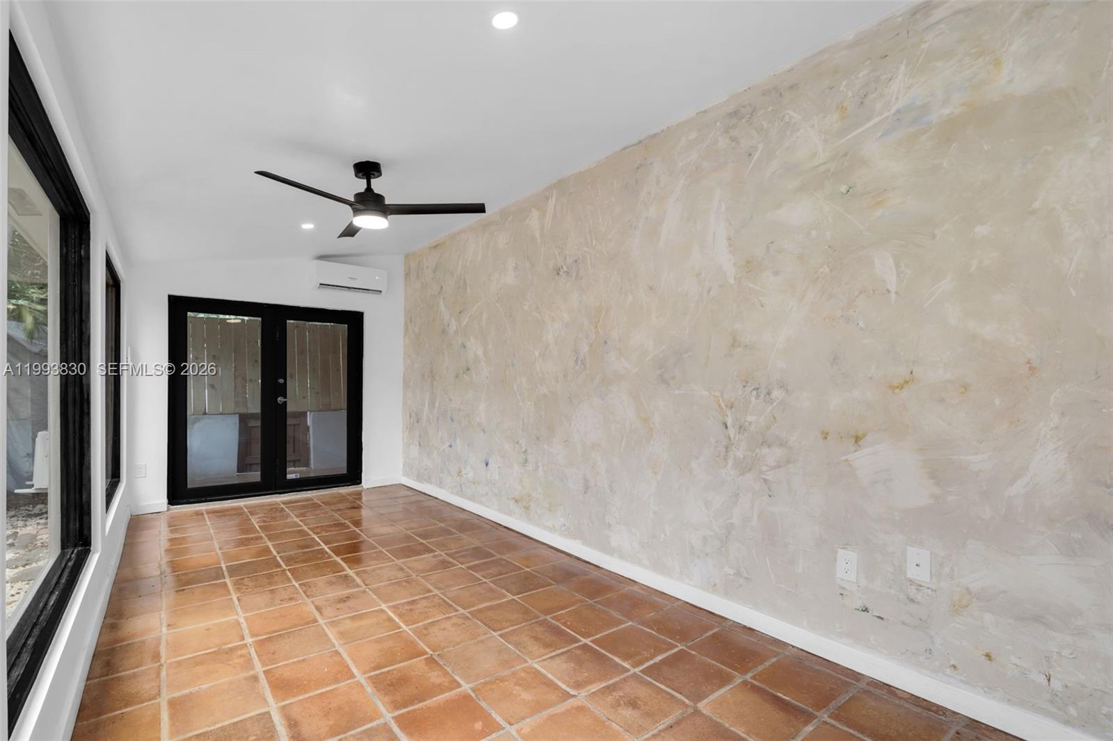 6295 Southwest 29th Street, Unit 1 Miami, FL 33155 - Photo 5 of 15 a view of an empty room