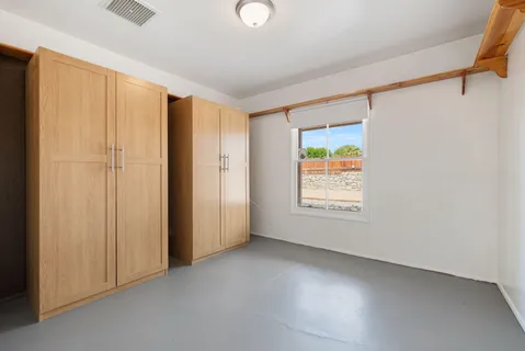 a view of a room with a flat screen tv