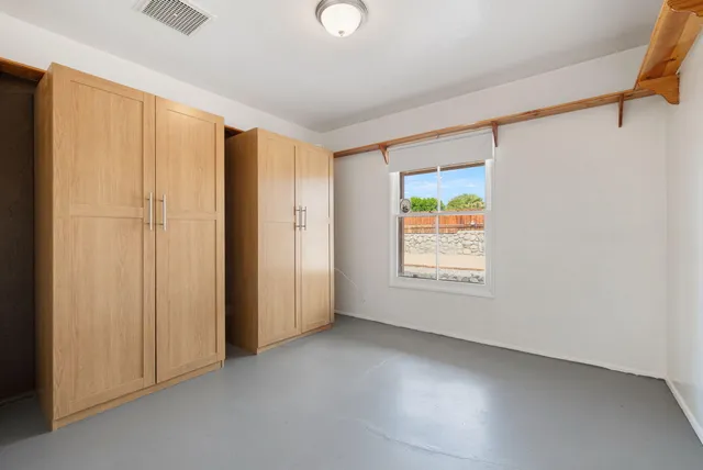 a view of a room with a flat screen tv