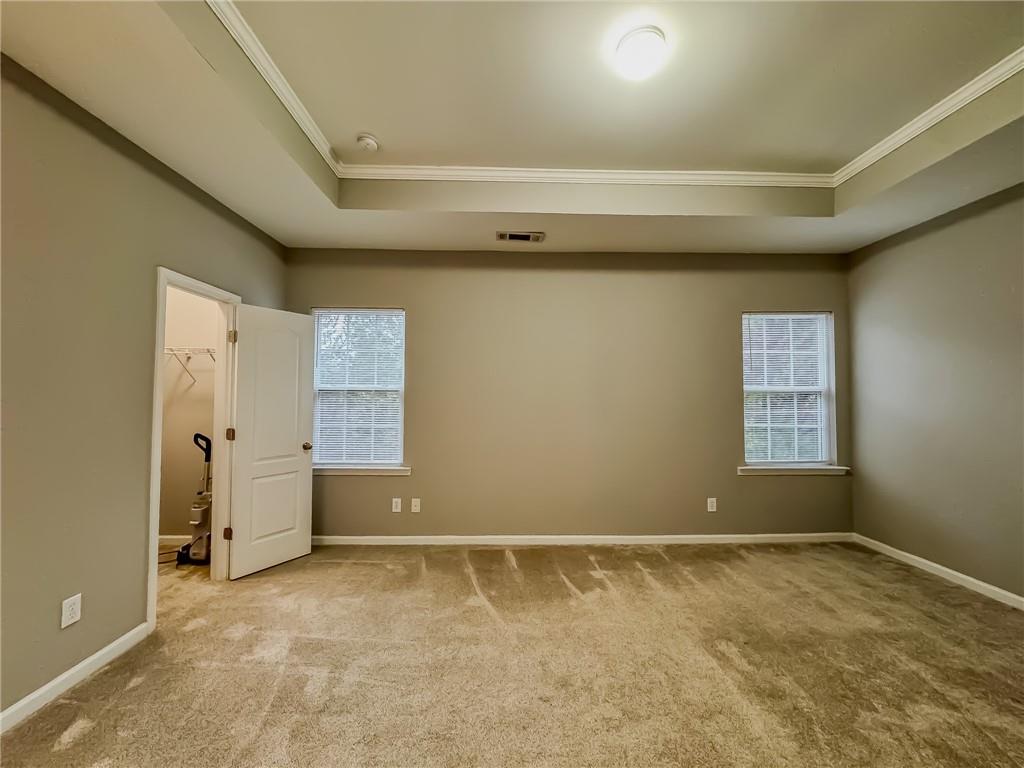 1218 Park Pass Way Suwanee, GA 30024 - Photo 15 of 23 an empty room with windows