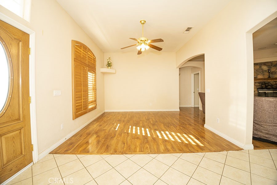 11830 Joshua Dell Road Victorville, CA 92392 - Photo 17 of 48 a view of a room with a ceiling fan