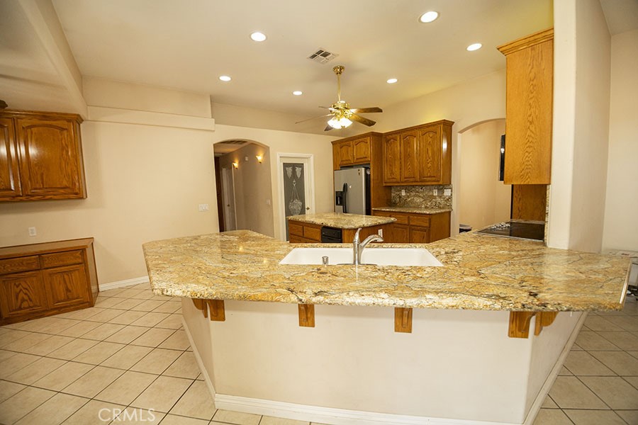 11830 Joshua Dell Road Victorville, CA 92392 - Photo 23 of 48 a view of a kitchen counter space