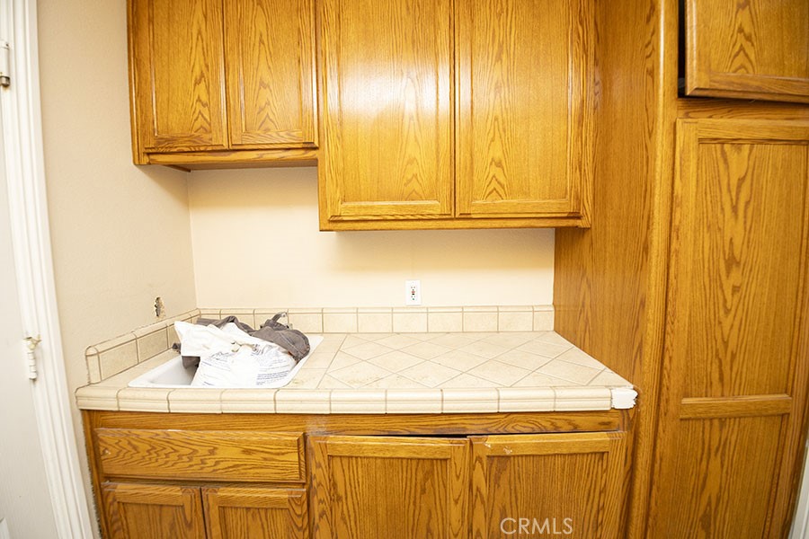 11830 Joshua Dell Road Victorville, CA 92392 - Photo 39 of 48 a bathroom with a sink and a vanity