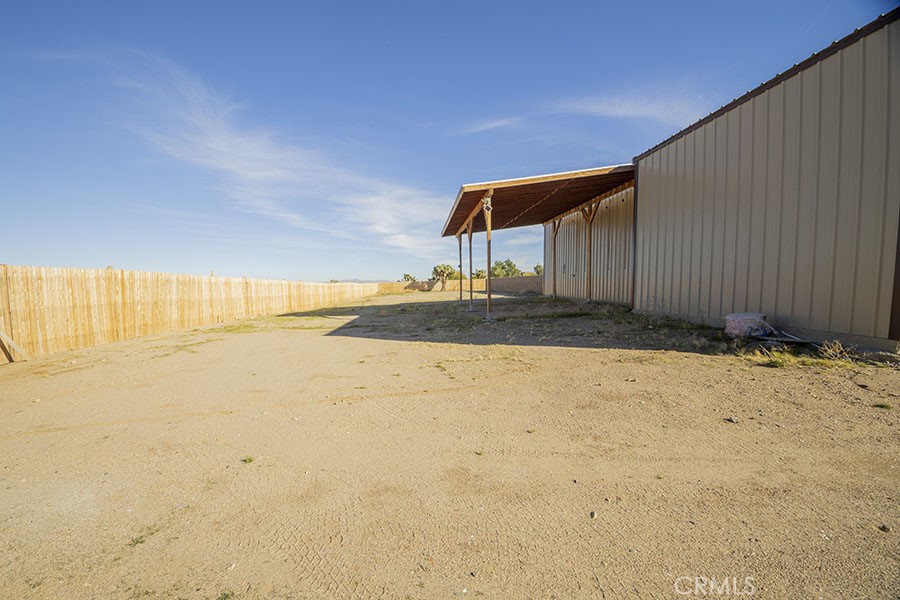 11830 Joshua Dell Road Victorville, CA 92392 - Photo 47 of 48 a view of a backyard of the house