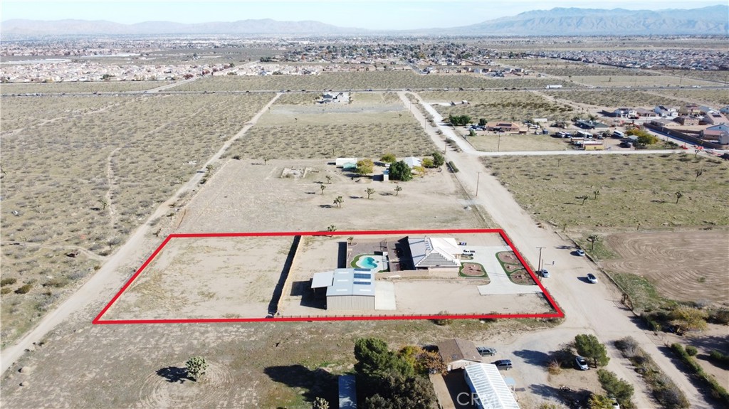 11830 Joshua Dell Road Victorville, CA 92392 - Photo 10 of 48 an aerial view of residential houses with outdoor space