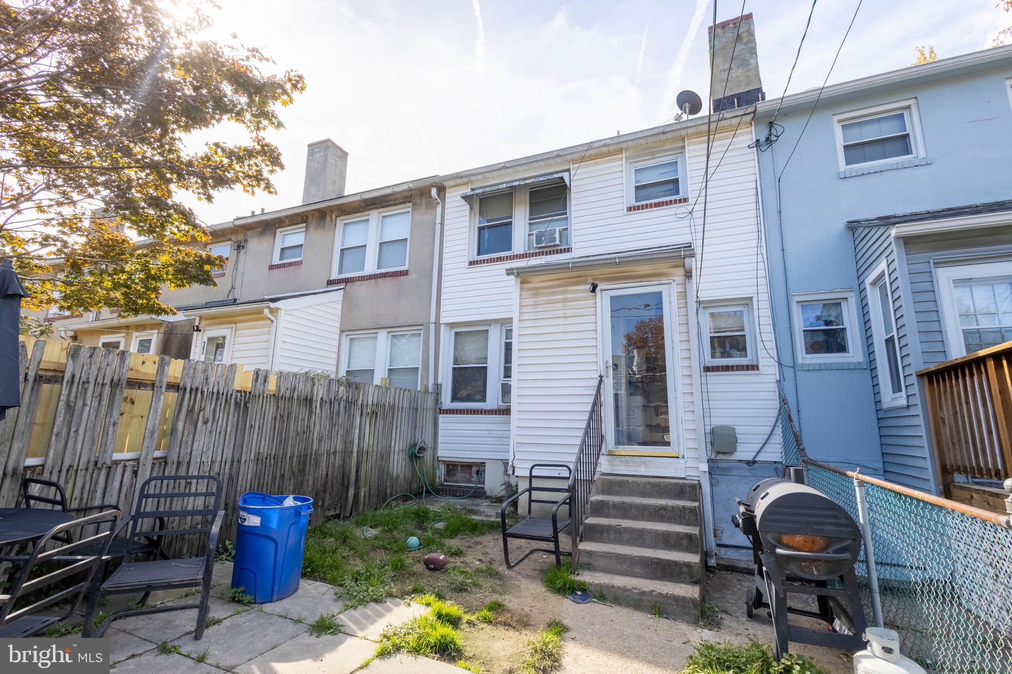 35 Kinship Road Baltimore, MD 21222 - Photo 15 of 15 a front view of a house with patio