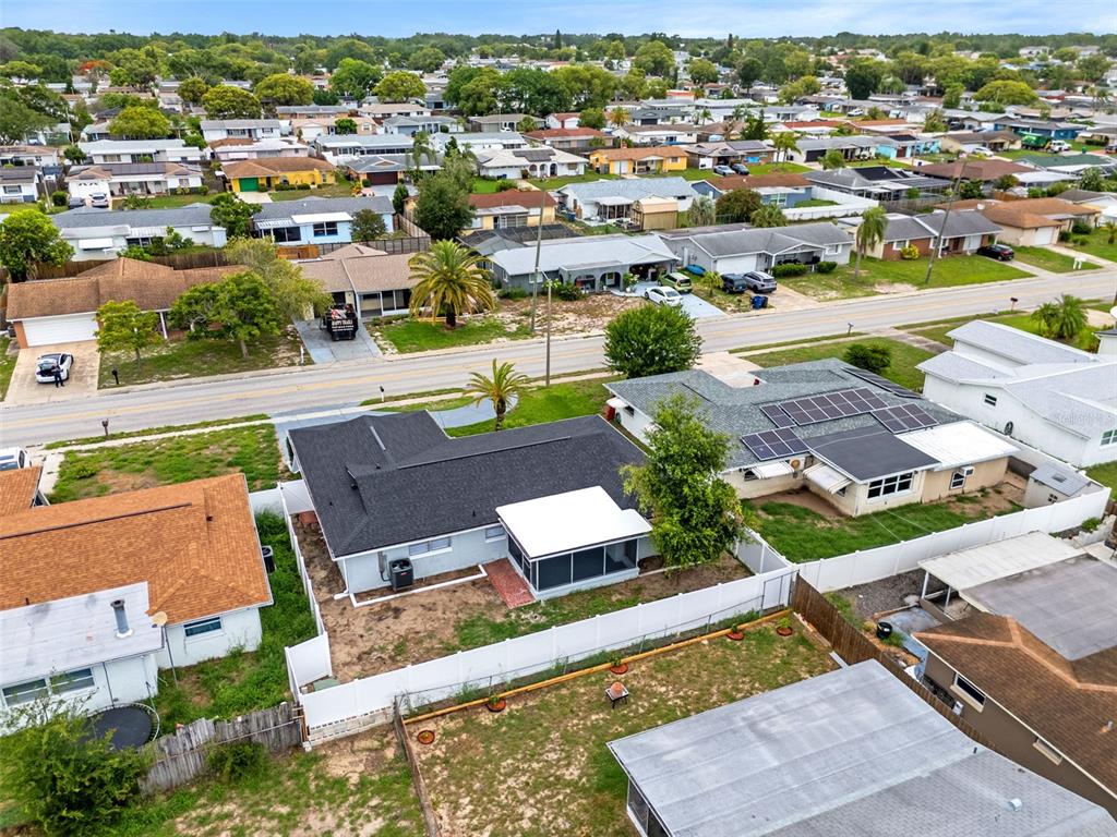 5626 Moog Road Holiday, FL 34690 - Photo 36 of 38 an aerial view of residential houses with outdoor space
