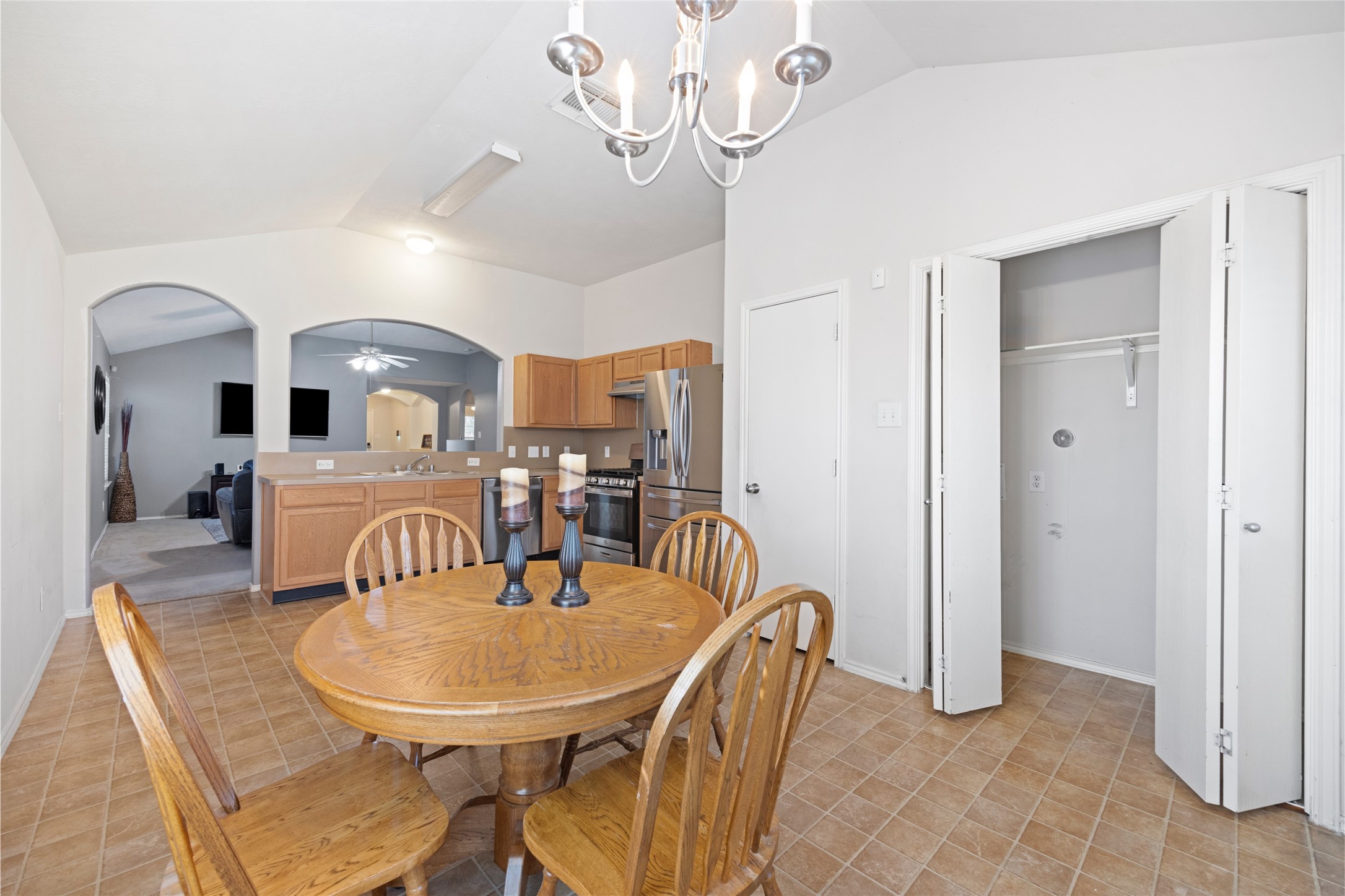 15926 Colonial Bridge Lane Houston, TX 77073 - Photo 12 of 27 a view of a dining room with furniture