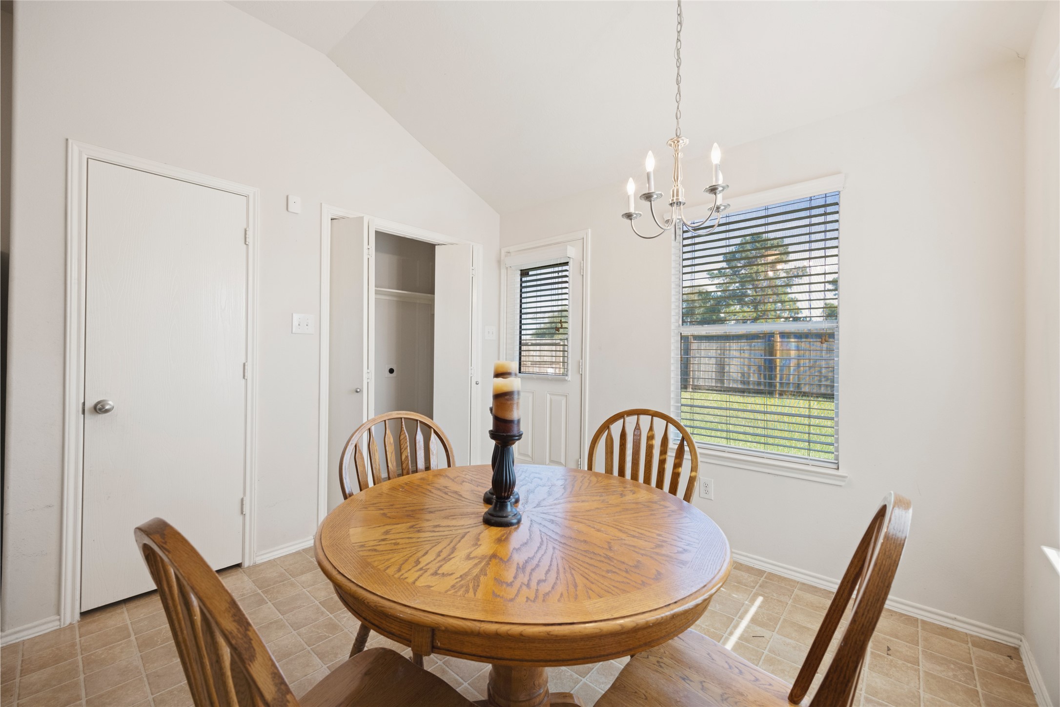 15926 Colonial Bridge Lane Houston, TX 77073 - Photo 13 of 27 a view of a dining room with furniture and window