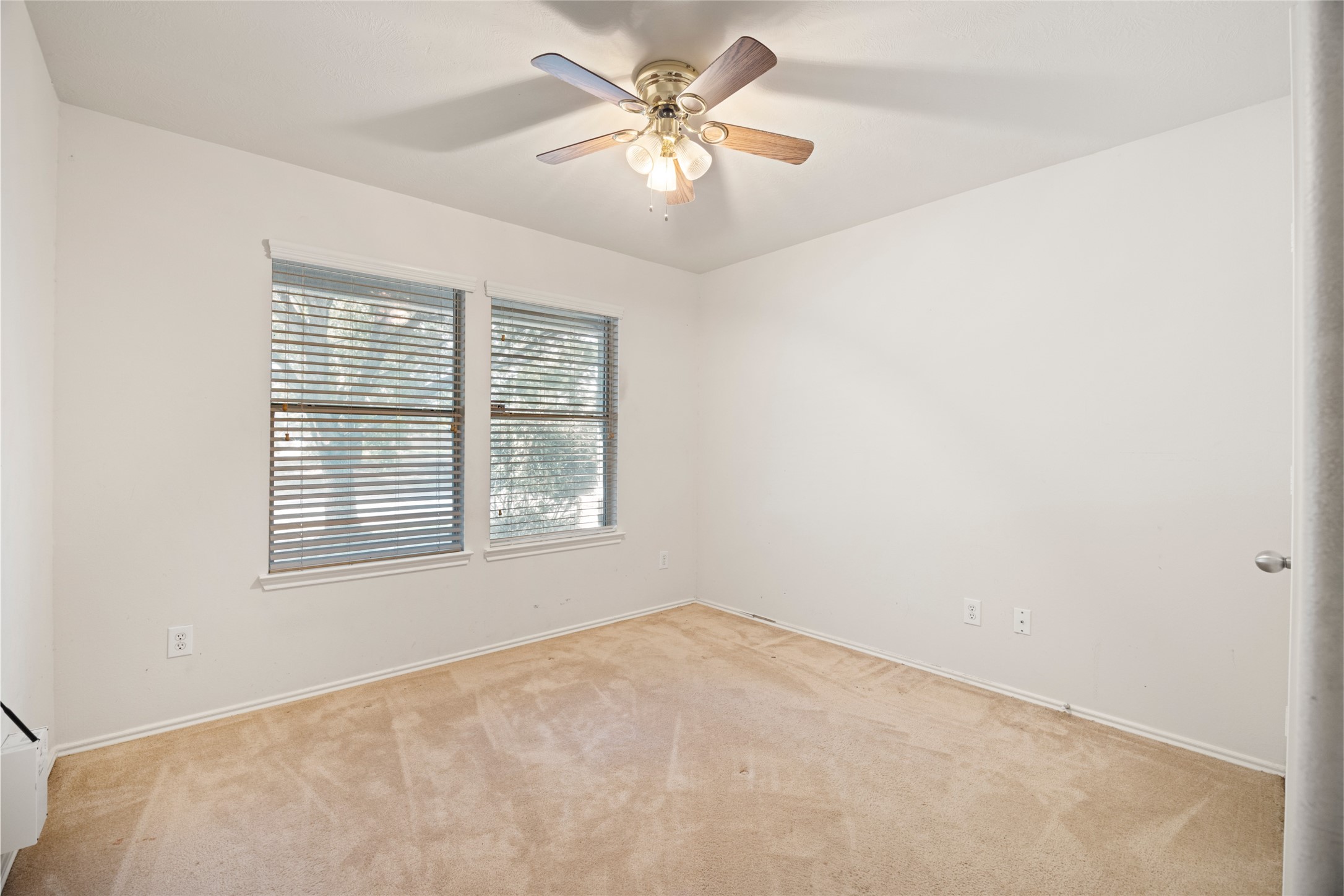 15926 Colonial Bridge Lane Houston, TX 77073 - Photo 19 of 27 a view of an empty room with a window